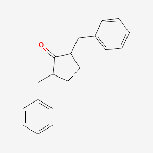 2,5-Bis(phenylmethyl)cyclopentanone