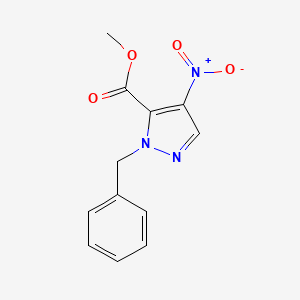 molecular formula C12H11N3O4 B1395572 1-苄基-4-硝基-1H-吡唑-5-甲酸甲酯 CAS No. 1353499-44-1