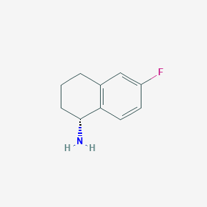 molecular formula C10H12FN B1396091 (R)-6-fluoro-1,2,3,4-tetrahydronaphthalen-1-amine CAS No. 1057246-78-2