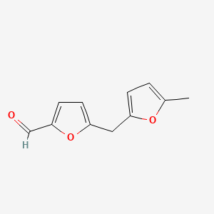 5-[(5-Methylfuran-2-yl)methyl]furan-2-carbaldehyde