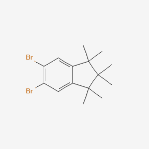 molecular formula C15H20Br2 B13966885 5,6-Dibromo-1,1,2,2,3,3-hexamethyl-2,3-dihydro-1H-indene 