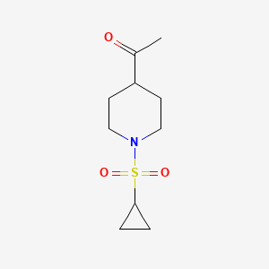 molecular formula C10H17NO3S B1396845 1-[1-(环丙烷磺酰基)哌啶-4-基]乙烷-1-酮 CAS No. 1341769-60-5