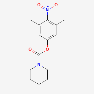 molecular formula C14H18N2O4 B13969837 1-Piperidinecarboxylic acid, 4-nitro-3,5-xylyl ester CAS No. 63867-70-9