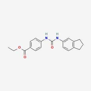 B1397010 ethyl 4-{[(2,3-dihydro-1H-inden-5-yl)carbamoyl]amino}benzoate CAS No. 893009-73-9