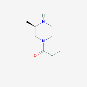 molecular formula C9H18N2O B1397210 2-甲基-1-[(3R)-3-甲基哌嗪-1-基]丙酮 CAS No. 1568205-93-5