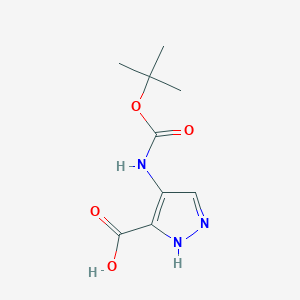 molecular formula C9H13N3O4 B1398111 4-[[(1,1-Dimethylethoxy)carbonyl]amino]-1H-pyrazole-3-carboxylic acid CAS No. 896466-71-0