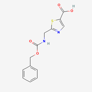 molecular formula C13H12N2O4S B1398641 2-((((Benzyloxy)carbonyl)amino)methyl)thiazole-5-carboxylic acid CAS No. 1095823-37-2