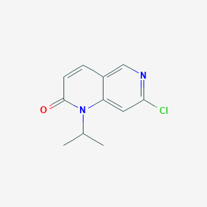 molecular formula C11H11ClN2O B13987204 7-Chloro-1-isopropyl-1,6-naphthyridin-2-one 