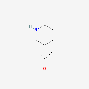 molecular formula C8H13NO B1398788 6-氮杂螺[3.5]壬烷-2-酮 CAS No. 1359703-25-5