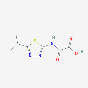 molecular formula C7H9N3O3S B1399070 [(5-Isopropyl-1,3,4-thiadiazol-2-yl)amino](oxo)acetic acid CAS No. 1158206-46-2