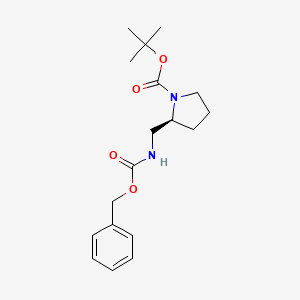 molecular formula C18H26N2O4 B1399395 (2s)-[[[(Phenylmethoxy)carbonyl]amino]methyl]-1-pyrrolidinecarboxylic acid 1,1-dimethylethyl ester CAS No. 929048-08-8