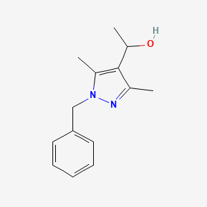 molecular formula C14H18N2O B1399598 1-(1-benzyl-3,5-dimethyl-1H-pyrazol-4-yl)ethanol CAS No. 1490755-93-5