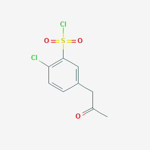 molecular formula C9H8Cl2O3S B1399753 2-Chloro-5-(2-oxopropyl)benzene-1-sulfonyl chloride CAS No. 593960-71-5