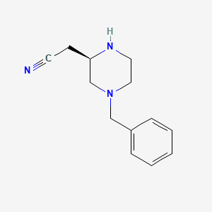 (R)-2-(4-Benzylpiperazin-2-yl)acetonitrile