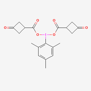 molecular formula C19H21IO6 B14007468 Mesityl-L3-iodanediyl bis(3-oxocyclobutane-1-carboxylate) 