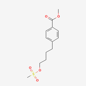 molecular formula C13H18O5S B14008432 Methyl 4-{4-[(methanesulfonyl)oxy]butyl}benzoate CAS No. 124656-56-0