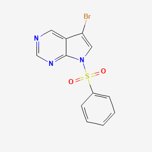 B1400898 5-Bromo-7-(phenylsulfonyl)-7H-Pyrrolo[2,3-d]pyrimidine CAS No. 1289190-97-1