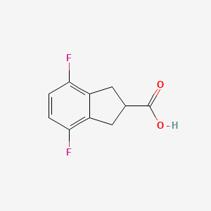 4,7-Difluoro-2,3-dihydro-1H-indene-2-carboxylic acid