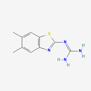 B1401920 N-(5,6-dimethyl-1,3-benzothiazol-2-yl)guanidine CAS No. 1379811-30-9