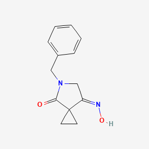 (E)-5-Benzyl-7-(hydroxyimino)-5-azaspiro[2.4]heptan-4-one