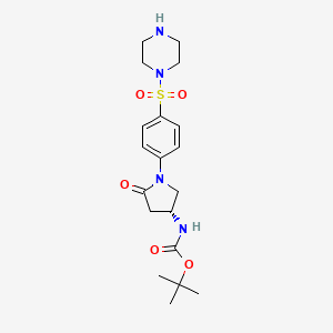 molecular formula C19H28N4O5S B14026176 (R)-4-(Boc-amino)-1-[4-(1-piperazinylsulfonyl)phenyl]pyrrolidin-2-one 