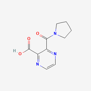 molecular formula C10H11N3O3 B14026303 3-(Pyrrolidine-1-carbonyl)pyrazine-2-carboxylic acid 