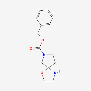 molecular formula C14H18N2O3 B14027149 Benzyl 1-oxa-4,7-diazaspiro[4.4]nonane-7-carboxylate 