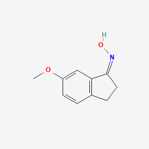 (E)-6-methoxy-2,3-dihydro-1H-inden-1-one oxime