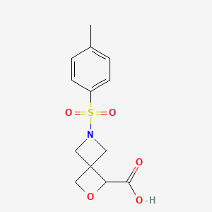 B1403973 6-Tosyl-2-oxa-6-azaspiro[3.3]heptane-1-carboxylic acid CAS No. 1349199-54-7
