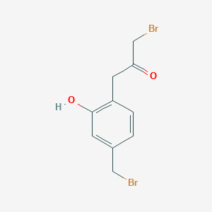 molecular formula C10H10Br2O2 B14046462 1-Bromo-3-(4-(bromomethyl)-2-hydroxyphenyl)propan-2-one 