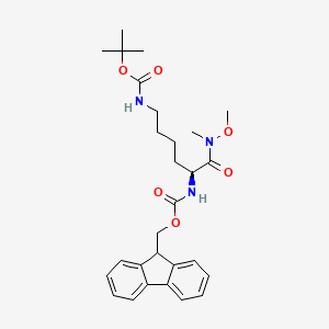 molecular formula C28H37N3O6 B1404715 叔丁基 N-[(5S)-5-{[(9H-芴-9-基甲氧羰基)氨基]-5-[甲氧基(甲基)氨基羰基]戊基}氨基甲酸酯 CAS No. 151145-21-0