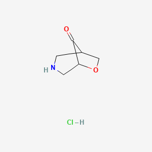 molecular formula C6H10ClNO2 B1405022 6-氧杂-3-氮杂双环[3.2.1]辛烷-8-酮盐酸盐 CAS No. 1408075-04-6