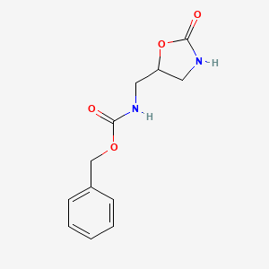 molecular formula C12H14N2O4 B14060605 benzyl N-[(2-oxo-1,3-oxazolidin-5-yl)methyl]carbamate 