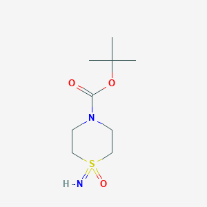 molecular formula C9H18N2O3S B1406515 Tert-butyl 1-imino-1-oxo-1(lambda6)-thiomorpholine-4-carboxylate CAS No. 1609964-38-6