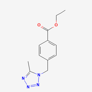 molecular formula C12H14N4O2 B1406617 Ethyl 4-[(5-methyl-1H-tetrazol-1-yl)methyl]benzoate CAS No. 1706431-18-6