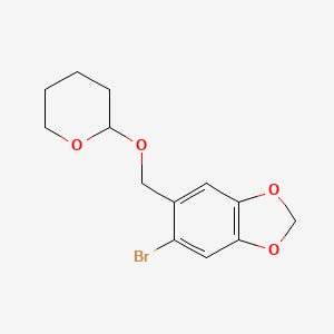 5-Bromo-6-{[(oxan-2-yl)oxy]methyl}-2H-1,3-benzodioxole