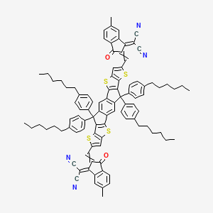 2-[2-[[20-[[3-(Dicyanomethylidene)-5-methyl-1-oxoinden-2-ylidene]methyl]-12,12,24,24-tetrakis(4-hexylphenyl)-5,9,17,21-tetrathiaheptacyclo[13.9.0.03,13.04,11.06,10.016,23.018,22]tetracosa-1(15),2,4(11),6(10),7,13,16(23),18(22),19-nonaen-8-yl]methylidene]-6-methyl-3-oxoinden-1-ylidene]propanedinitrile