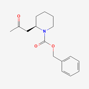 molecular formula C16H21NO3 B14082898 benzyl (R)-2-(2-oxopropyl)piperidine-1-carboxylate 