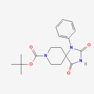 molecular formula C18H23N3O4 B1408653 叔丁基 2,4-二氧代-1-苯基-1,3,8-三氮杂螺[4.5]癸烷-8-羧酸盐 CAS No. 1815591-36-6