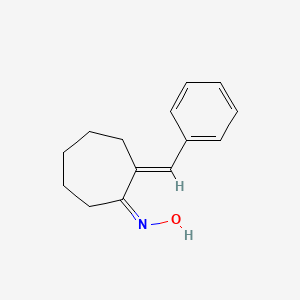 Cycloheptanone, 2-(phenylmethylene)-, oxime, (E,E)-