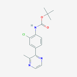B1412354 Tert-butyl (2-chloro-4-(3-methylpyrazin-2-yl)phenyl)carbamate CAS No. 2208654-61-7