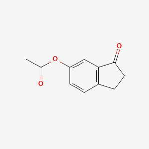 1H-Inden-1-one, 6-(acetyloxy)-2,3-dihydro-