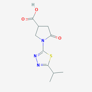 molecular formula C10H13N3O3S B1413624 1-(5-Isopropyl-1,3,4-thiadiazol-2-yl)-5-oxopyrrolidine-3-carboxylic acid CAS No. 2173108-88-6