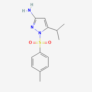 molecular formula C13H17N3O2S B1413646 5-异丙基-1-[(4-甲苯基)磺酰基]-1H-吡唑-3-胺 CAS No. 2173136-44-0