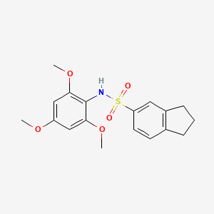 molecular formula C18H21NO5S B1414063 N-(2,4,6-trimethoxyphenyl)indane-5-sulfonamide CAS No. 2232877-40-4