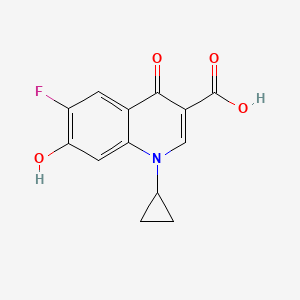 molecular formula C13H10FNO4 B14145240 3-Quinolinecarboxylic acid,1-cyclopropyl-6-fluoro-1,4-dihydro-7-hydroxy-4-oxo- CAS No. 130579-27-0