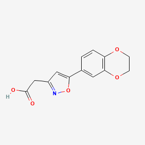 molecular formula C13H11NO5 B1414910 [5-(2,3-Dihydro-1,4-benzodioxin-6-yl)isoxazol-3-yl]acetic acid CAS No. 1018663-30-3