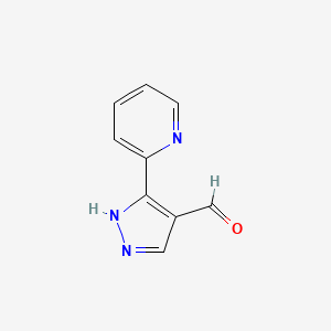 molecular formula C9H7N3O B1414990 3-Pyridin-2-yl-1H-pyrazole-4-carbaldehyde CAS No. 1152541-98-4
