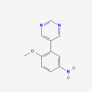 4-Methoxy-3-(pyrimidin-5-yl)aniline