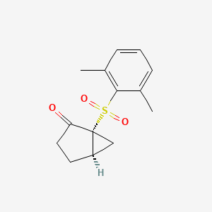 molecular formula C14H16O3S B14172720 (1R,5R)-1-(2,6-Dimethylbenzene-1-sulfonyl)bicyclo[3.1.0]hexan-2-one CAS No. 923001-94-9